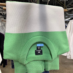 Ready-for-pickup garments on the rack
